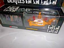 THE BEATLES CORGI YELLOW SUBMARINE & 4 METAL BEATLES FIGURES BLACK BOXED ISSUE .