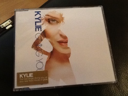 Kylie minogue giving you - ., up