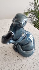 Vintage Otter Seal Holding