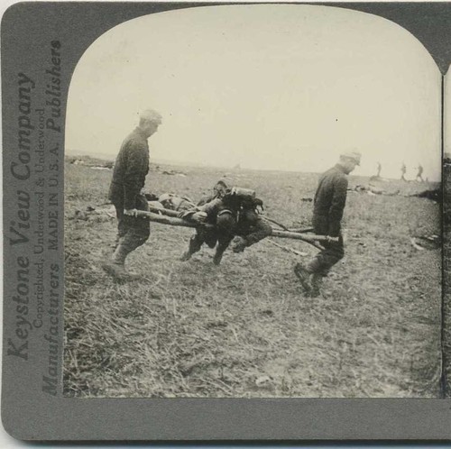 Soldiers carrying wounded - , on