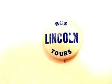 older metal advertising pin