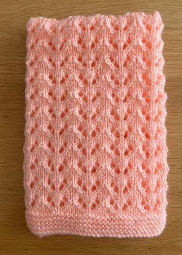 Hand knitted peach doll - hand,