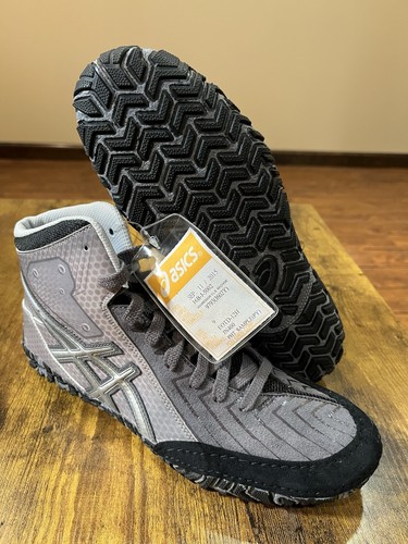 Asics aggressor e - asics, l.e