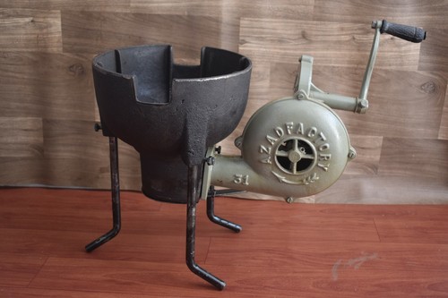 Blacksmith forge with hand - with,