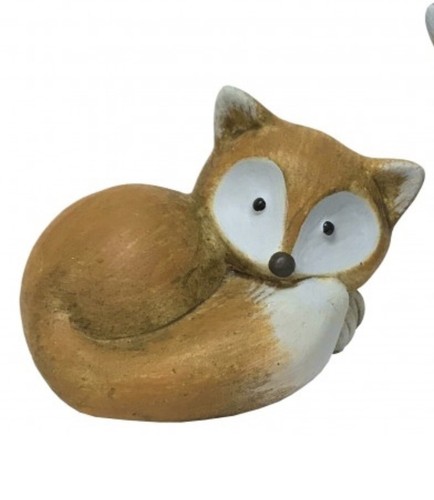Small ceramic fox laying down - laying,