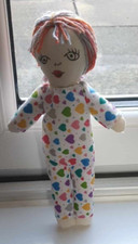 Handcrafted 9-inch rag doll, a delightful addition to any collection or a heartw