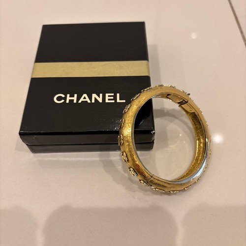 Chanel gold flower motif - chanel,