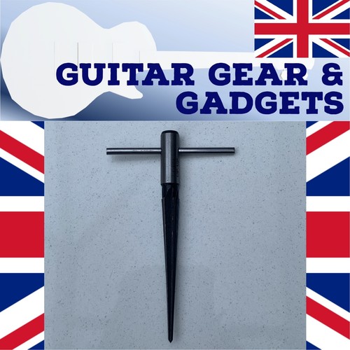 Guitar bridge pin hole - bridge,