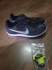 Size 4 - Nike Zoom Rival
