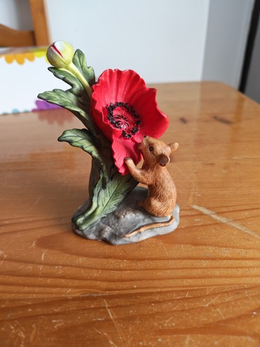 Mouse smelling flower - smelling, a