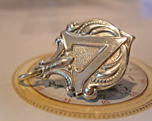 Silver pocket watch chain fob - watch,