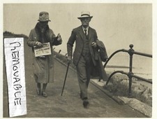 Vintage Old Family Photograph Man Lady Hats Coats Newspaper Walking 1920's