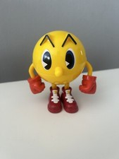 Pac-Man Figure Ghost Grabbing With Toung 