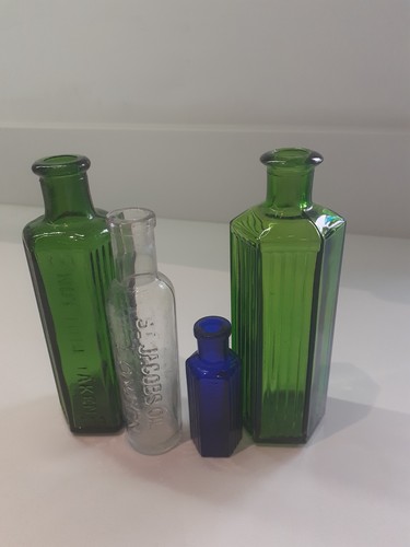 Antique medicine bottles - 4,