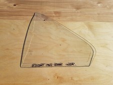 VIRTUALY NEW GENUINE FORD ESCORT MK2 N/S/R DOOR 1/4 GLASS NON TINTED FOR 4 DOOR.