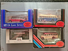 boxed corgi buses