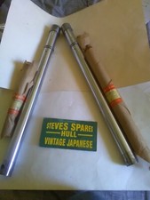 SUZUKI B100,B100P,B105,B120,KT120 ,FORK STANCTIONS Pair ,51110-07010 ,NOS,NLA .