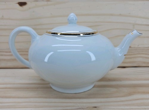 White teapot with gold - with,
