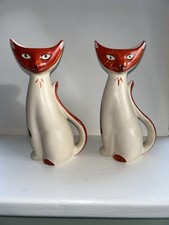 Pair of ceramic cat figurines