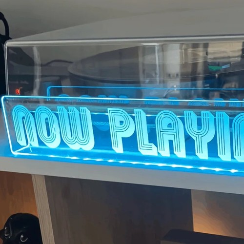 Now playing vinyl record stand - record,