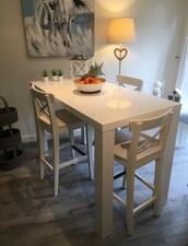 2 white IKEA INGOLF stools