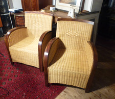 A Pair Of Club Armchairs In