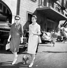 Audrey Hepburn walking her dog