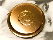 Gold tone art deco radial