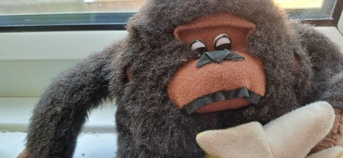 Gorilla with banana - gorilla,