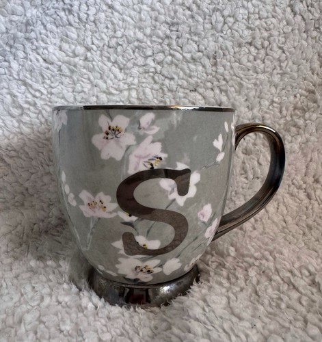 Tesco fox ivy initial - &,