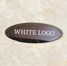 Steering wheel dome badge for