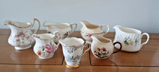 7 MISMATCHED VINTAGE BONE