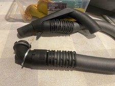 Handle + Hose Assembly = Miele