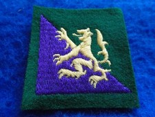 BRITISH MILITARY 1945-1989 HIGHLAND DISTRICT EMBROIDERED FORMATION ARM BADGE