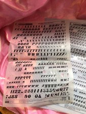 Two Old sheets Of Rub-Down