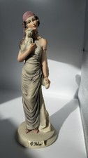 A Belcari Lady Figurine With