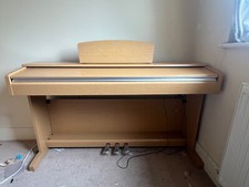 Yamaha Arius digital piano.  YDP-141.  Light oak.  88 keys.  In good condition.