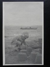 Small Child MAKING SAND