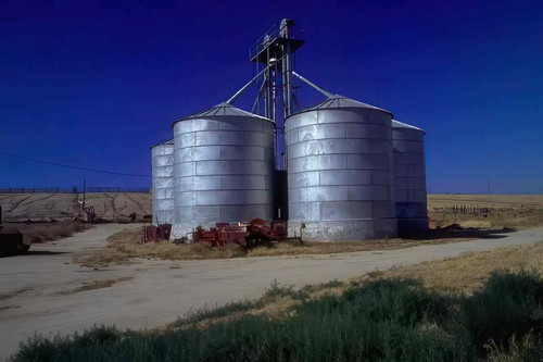 Grain silos tractor photo - grain,