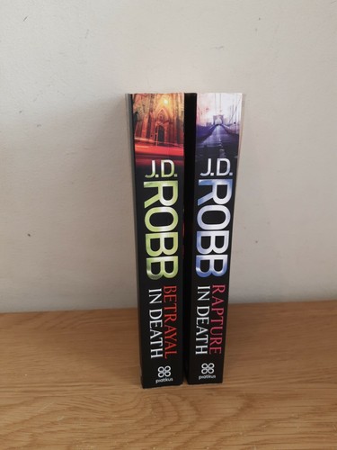 Robb two paperback novels - two,