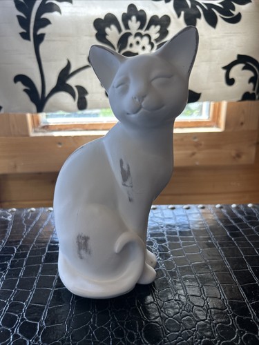 White wood cat sitting large - sitting,