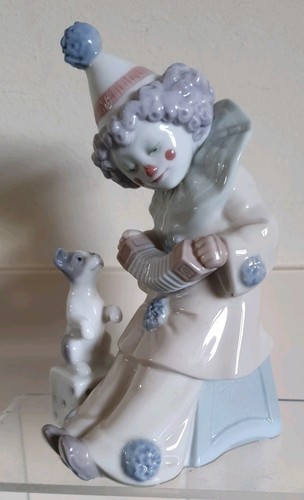 Lladro clown with - clown, puppy