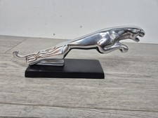 Chrome Jaguar Leaping On Black