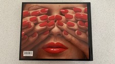 Guy bourdin between book - guy,