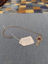 Edinburgh silver Celtic cross necklace with amethyst coloured centre stone,