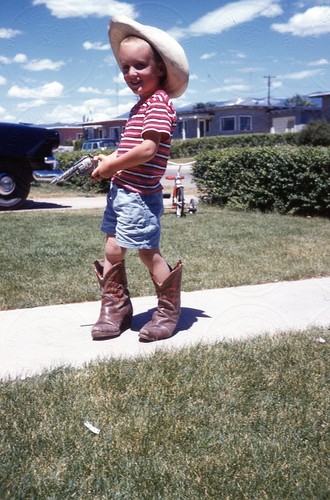 Cute kid dressed - as, cowboy