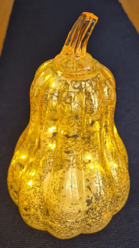 Amber coloured silvered glass