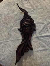 Hand Carved Leather Face Wall