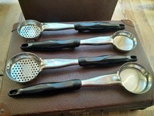 Vollrath  Pizza Portion Spoodle Round Black Solid And Perforated 2oz And 3oz.