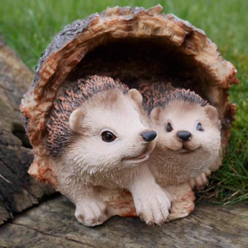 Hedgehogs log home - hedgehogs,